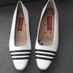 White and black low heeled pumps barely worn